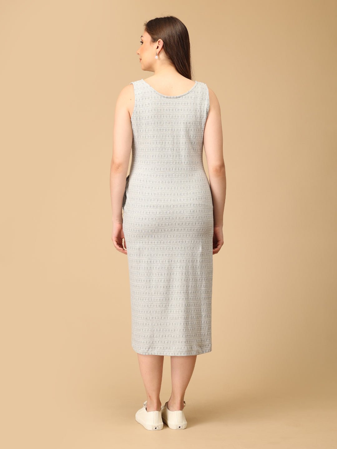 Elegant maternity and nursing dress with shrug in soft grey pattern, designed for pregnant and breastfeeding moms. Made from breathable fabric with hidden zipper for easy nursing access, side pockets, and detachable shrug. Perfect for maternity wear India, feeding dresses online, and everyday comfort with effortless style.