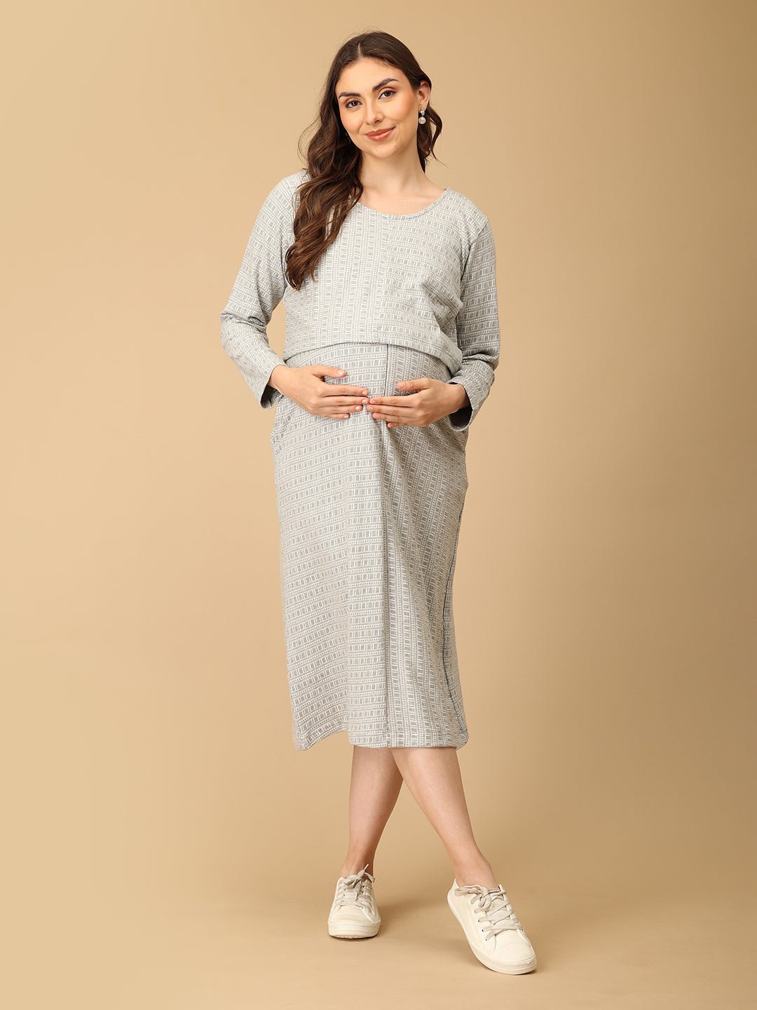 Elegant maternity and nursing dress with shrug in soft grey pattern, designed for pregnant and breastfeeding moms. Made from breathable fabric with hidden zipper for easy nursing access, side pockets, and detachable shrug. Perfect for maternity wear India, feeding dresses online, and everyday comfort with effortless style.