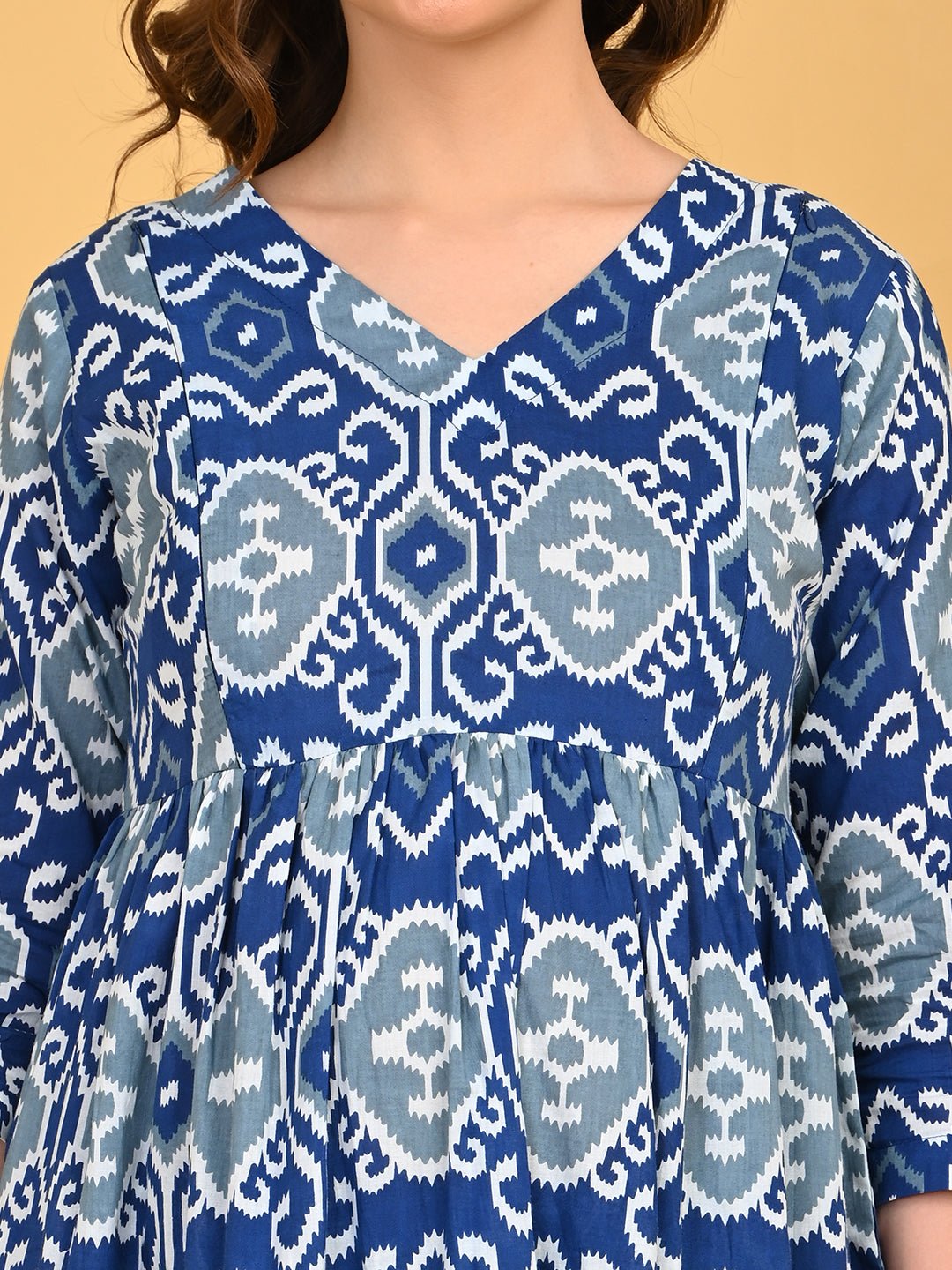Close-up of V-neck and ikat print on Indigo Mode Maternity and Nursing Kurta Set With Dupatta.