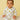 Picture of a baby wearing jabla style romper with chick and egg designs from the mom store