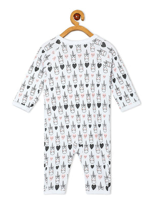 Close up Picture of backside of a jabla style romper with unicorn designs from the mom store hanging on a rack