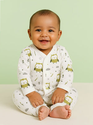 Picture of a baby wearing jabla style romper with owl designs from the mom store