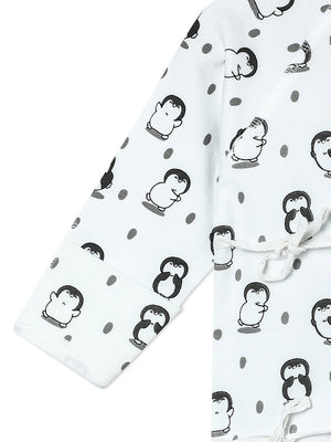Close up Picture of a limb of jabla style romper from the mom store showing penguin designs