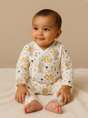 Picture of a baby wearing jabla style romper with bear designs from the mom store
