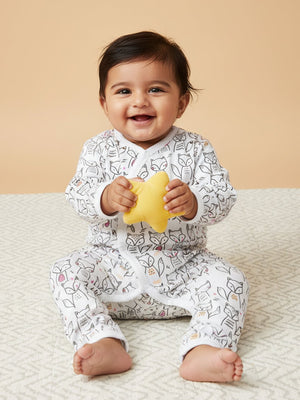 Picture of a baby wearing jabla style romper with fox designs from the mom store