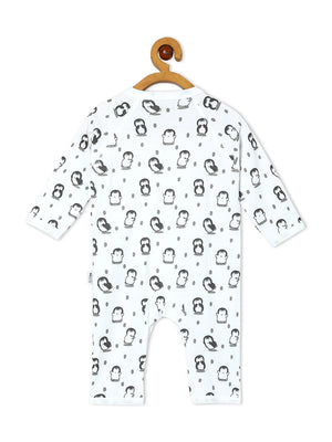 Close up Picture of backside of a jabla style romper with penguin designs from the mom store hanging on a rack