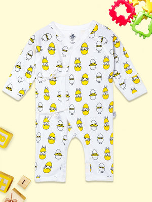 Picture of a jabla style romper with chick and egg designs kept on a yellow background from the mom store