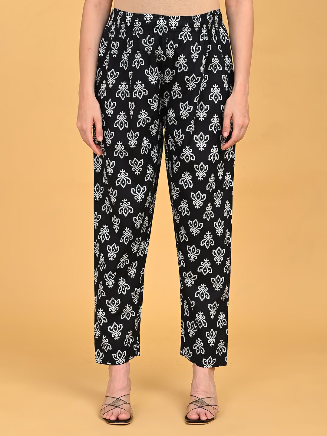 Front view of straight-fit printed pants from Ivory Shadow Maternity and Nursing Kurta Set With Dupatta.