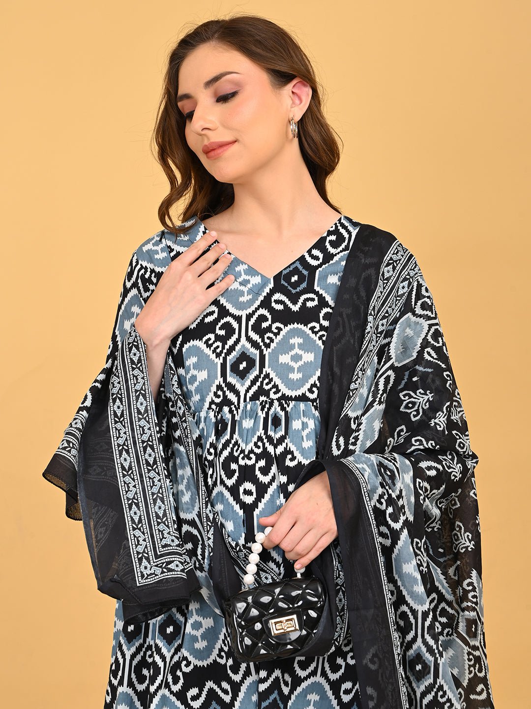 Close-up of V-neck and ikat print on Ivory Shadow Maternity and Nursing Kurta Set With Dupatta.