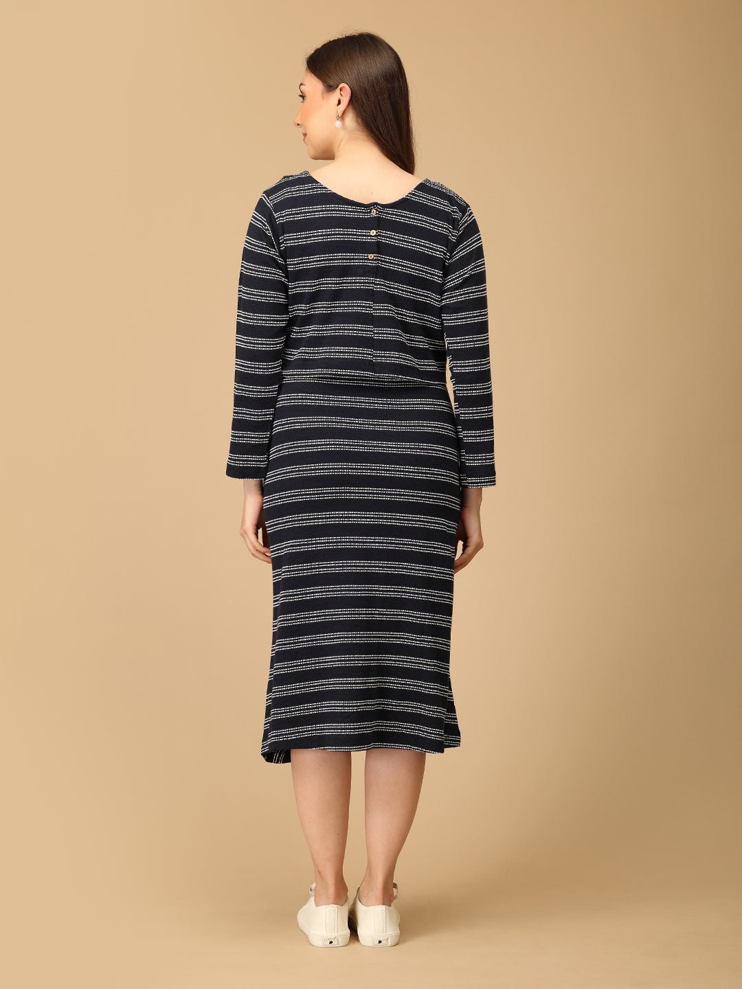 Trendy maternity and nursing dress with shrug in navy blue and white stripes, perfect for pregnant and new moms. Made from soft, breathable fabric with hidden zipper nursing access and side pockets. Ideal for maternity wear India, feeding dress online, and postpartum fashion—combining comfort, style, and functionality for everyday wear.