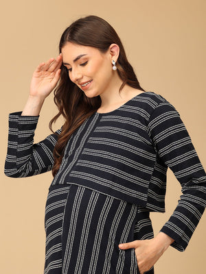 Trendy maternity and nursing dress with shrug in navy blue and white stripes, perfect for pregnant and new moms. Made from soft, breathable fabric with hidden zipper nursing access and side pockets. Ideal for maternity wear India, feeding dress online, and postpartum fashion‚Äîcombining comfort, style, and functionality for everyday wear.