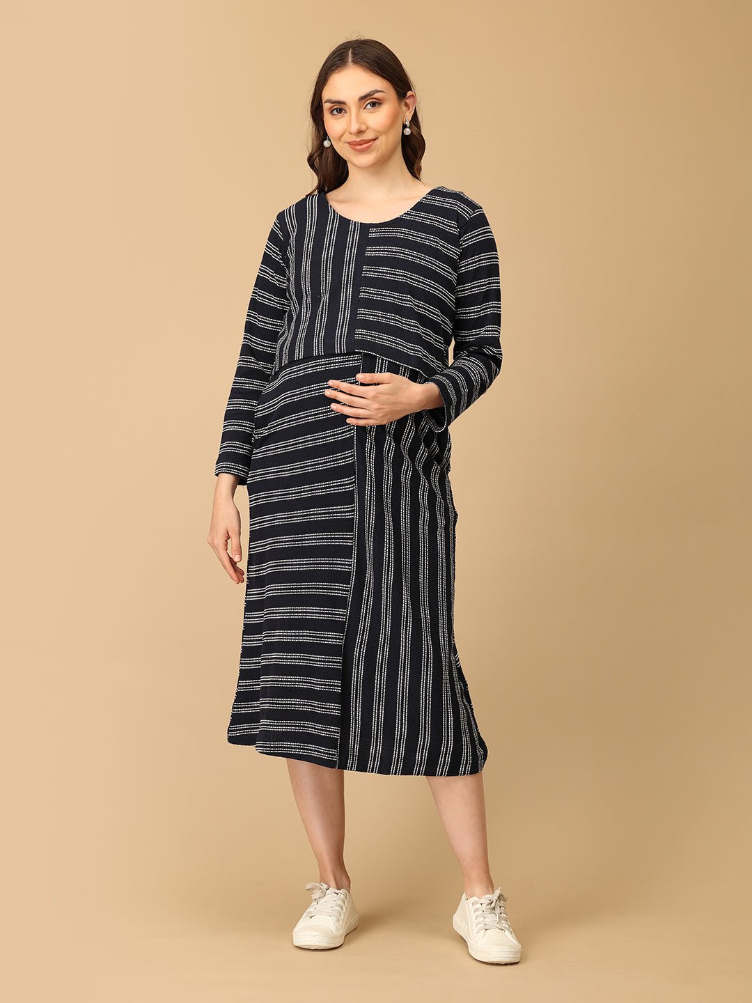 Trendy maternity and nursing dress with shrug in navy blue and white stripes, perfect for pregnant and new moms. Made from soft, breathable fabric with hidden zipper nursing access and side pockets. Ideal for maternity wear India, feeding dress online, and postpartum fashion—combining comfort, style, and functionality for everyday wear.
