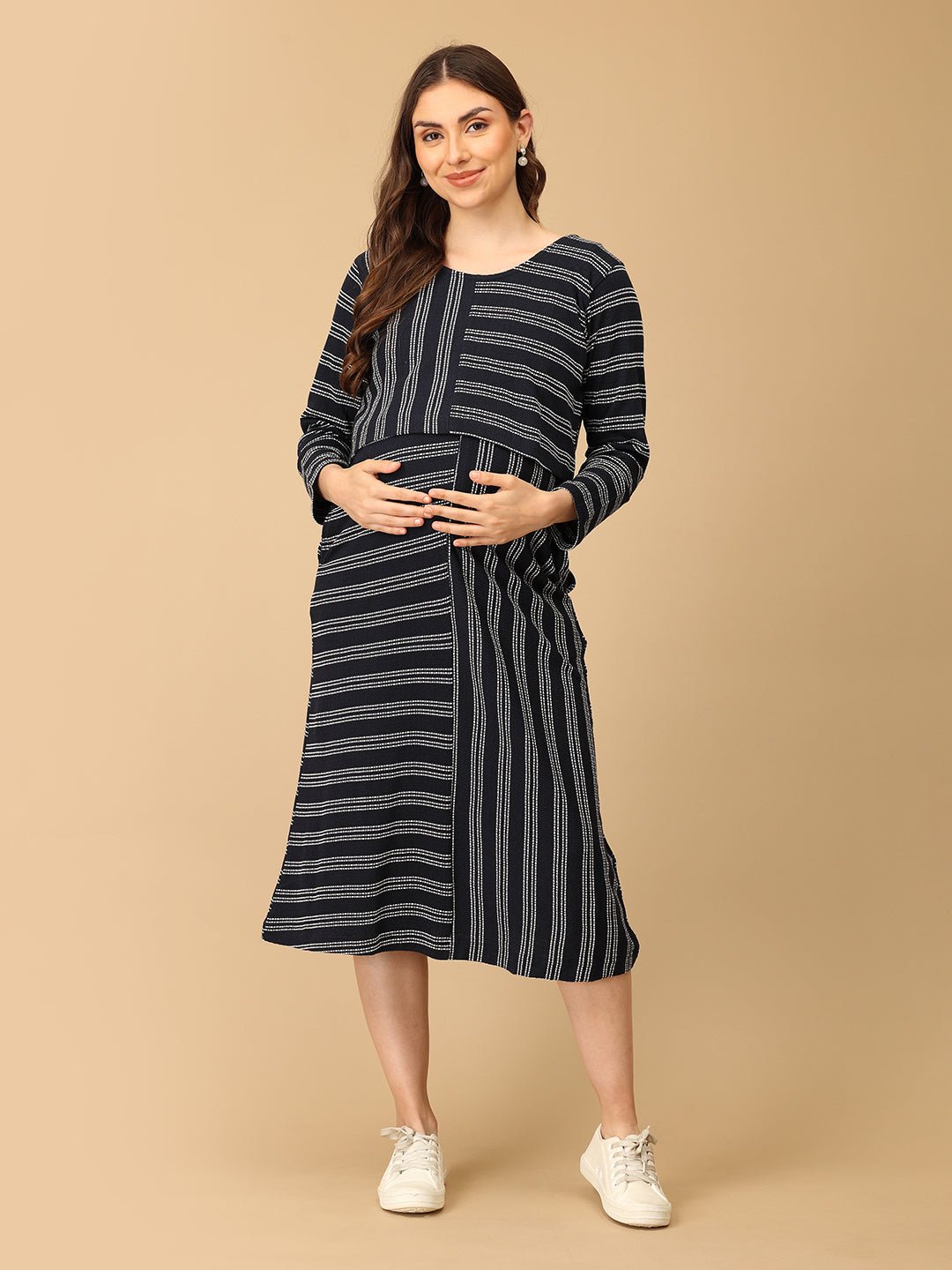 Trendy maternity and nursing dress with shrug in navy blue and white stripes, perfect for pregnant and new moms. Made from soft, breathable fabric with hidden zipper nursing access and side pockets. Ideal for maternity wear India, feeding dress online, and postpartum fashion—combining comfort, style, and functionality for everyday wear.
