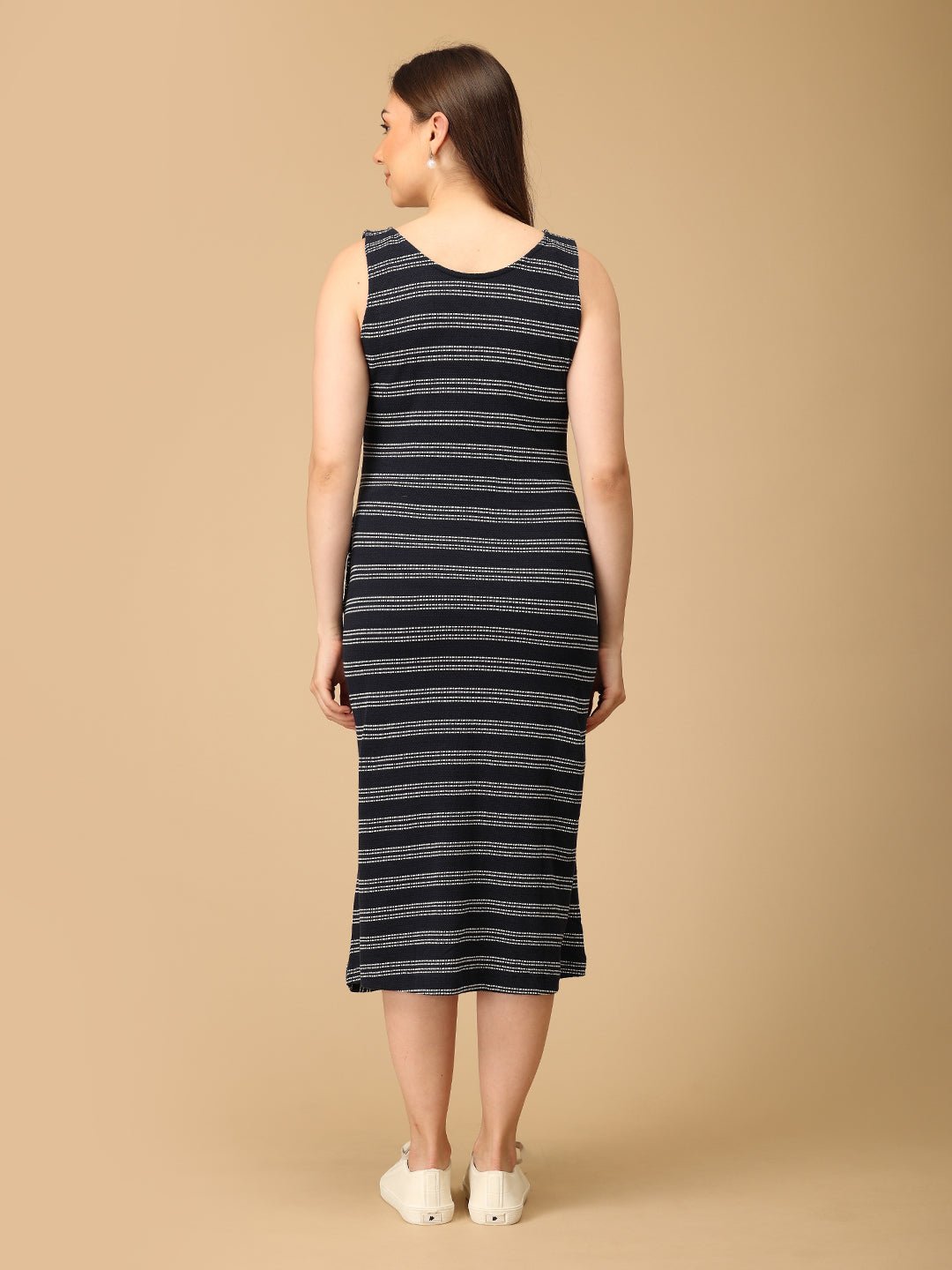 Trendy maternity and nursing dress with shrug in navy blue and white stripes, perfect for pregnant and new moms. Made from soft, breathable fabric with hidden zipper nursing access and side pockets. Ideal for maternity wear India, feeding dress online, and postpartum fashion—combining comfort, style, and functionality for everyday wear.