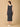 Trendy maternity and nursing dress with shrug in navy blue and white stripes, perfect for pregnant and new moms. Made from soft, breathable fabric with hidden zipper nursing access and side pockets. Ideal for maternity wear India, feeding dress online, and postpartum fashion—combining comfort, style, and functionality for everyday wear.