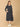 Trendy maternity and nursing dress with shrug in navy blue and white stripes, perfect for pregnant and new moms. Made from soft, breathable fabric with hidden zipper nursing access and side pockets. Ideal for maternity wear India, feeding dress online, and postpartum fashion—combining comfort, style, and functionality for everyday wear.