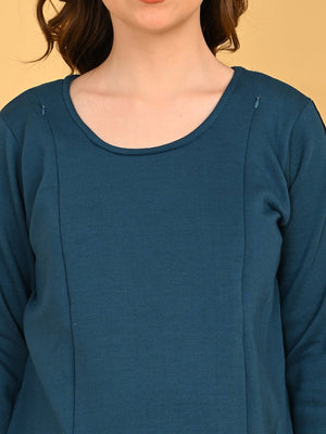 Close-up of Neckline on Keepin‚Äô It Teal maternity top for easy nursing access.