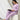 Pregnant lady wearing Lavender Lush Maternity and Nursing Pajama Loungewear Set from the Mom store reading a book