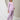 Pregnant lady wearing Lavender Lush Maternity and Nursing Pajama Loungewear Set from the Mom store with a hand on her belly