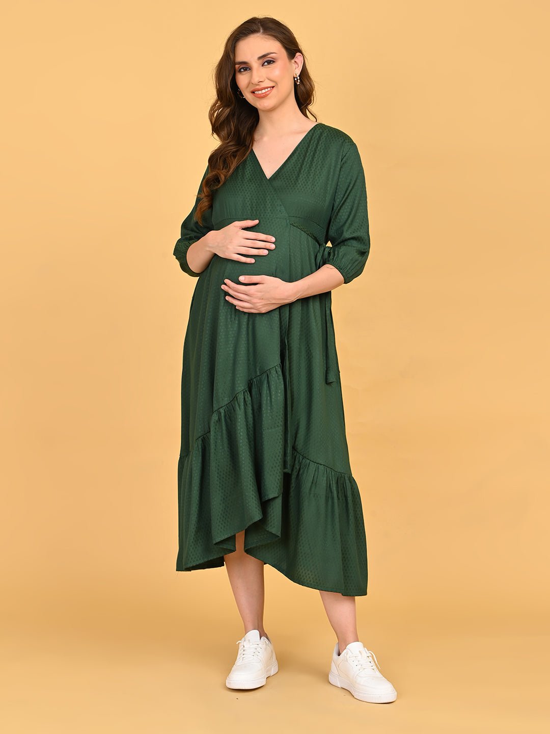Leaf Me Breathless Maternity Wrap Dress side profile view emphasizing bump-friendly fit and adjustable waist tie detail.