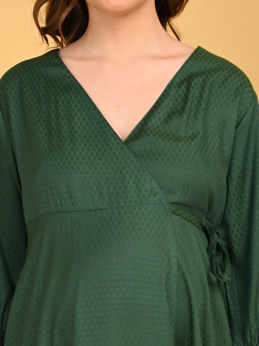 Leaf Me Breathless Maternity Wrap Dress close-up of V-neck wrap bodice with subtle textured pattern.