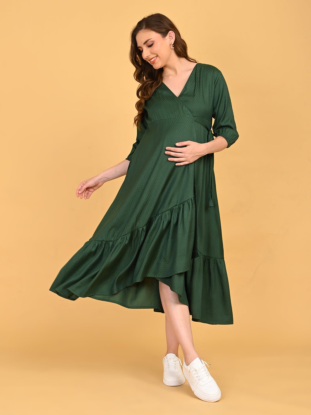 Leaf Me Breathless Maternity Wrap Dress full-length twirl pose showcasing layered ruffle hem and flowy silhouette.