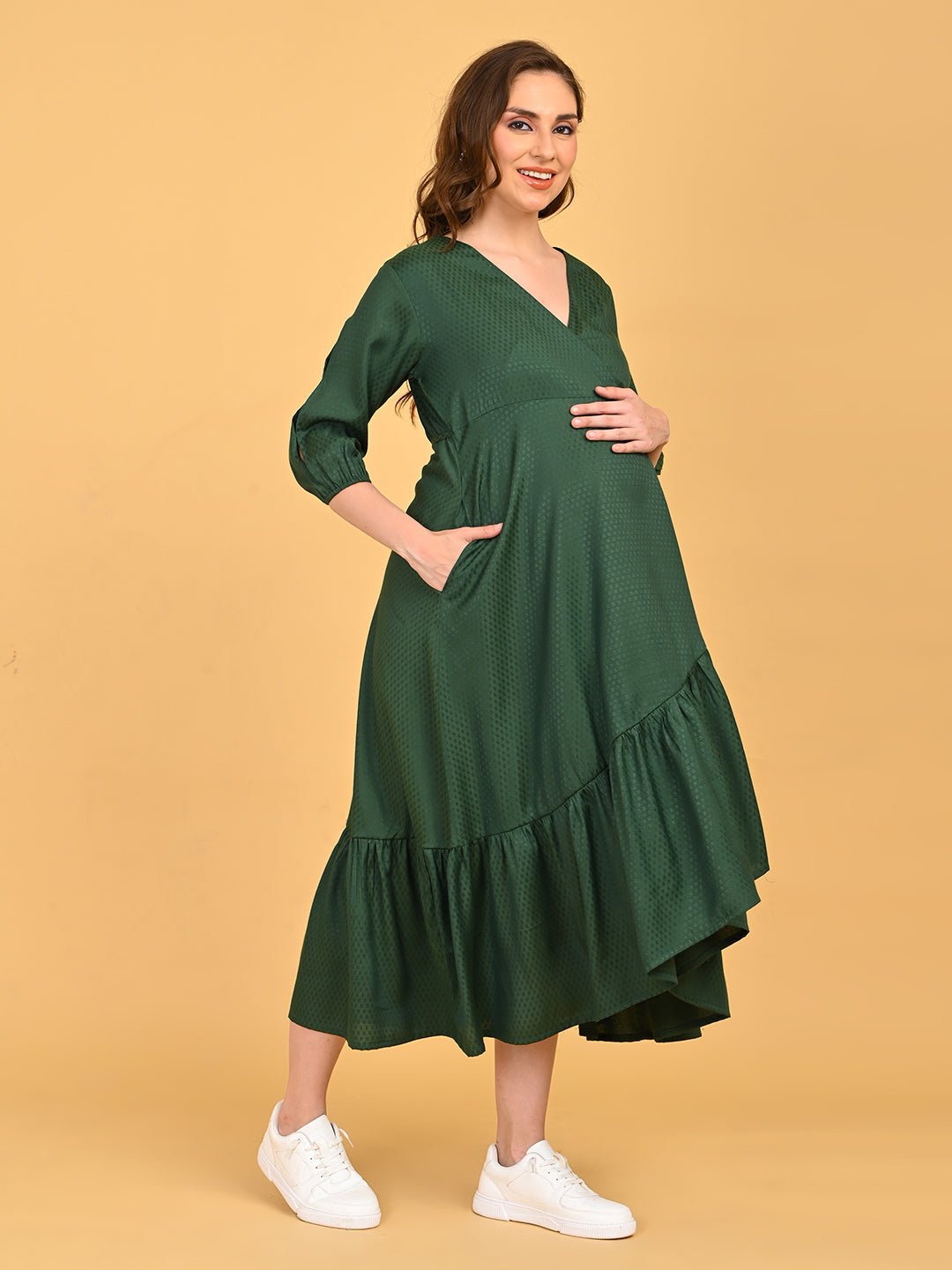 Leaf Me Breathless Maternity Wrap Dress front view with hands on baby bump, emphasizing flattering wrap design and midi length.
