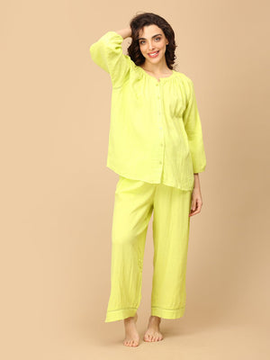 Playful pose by model wearing Lime - o - Clock Maternity and Nursing Nightwear Set from the mom store