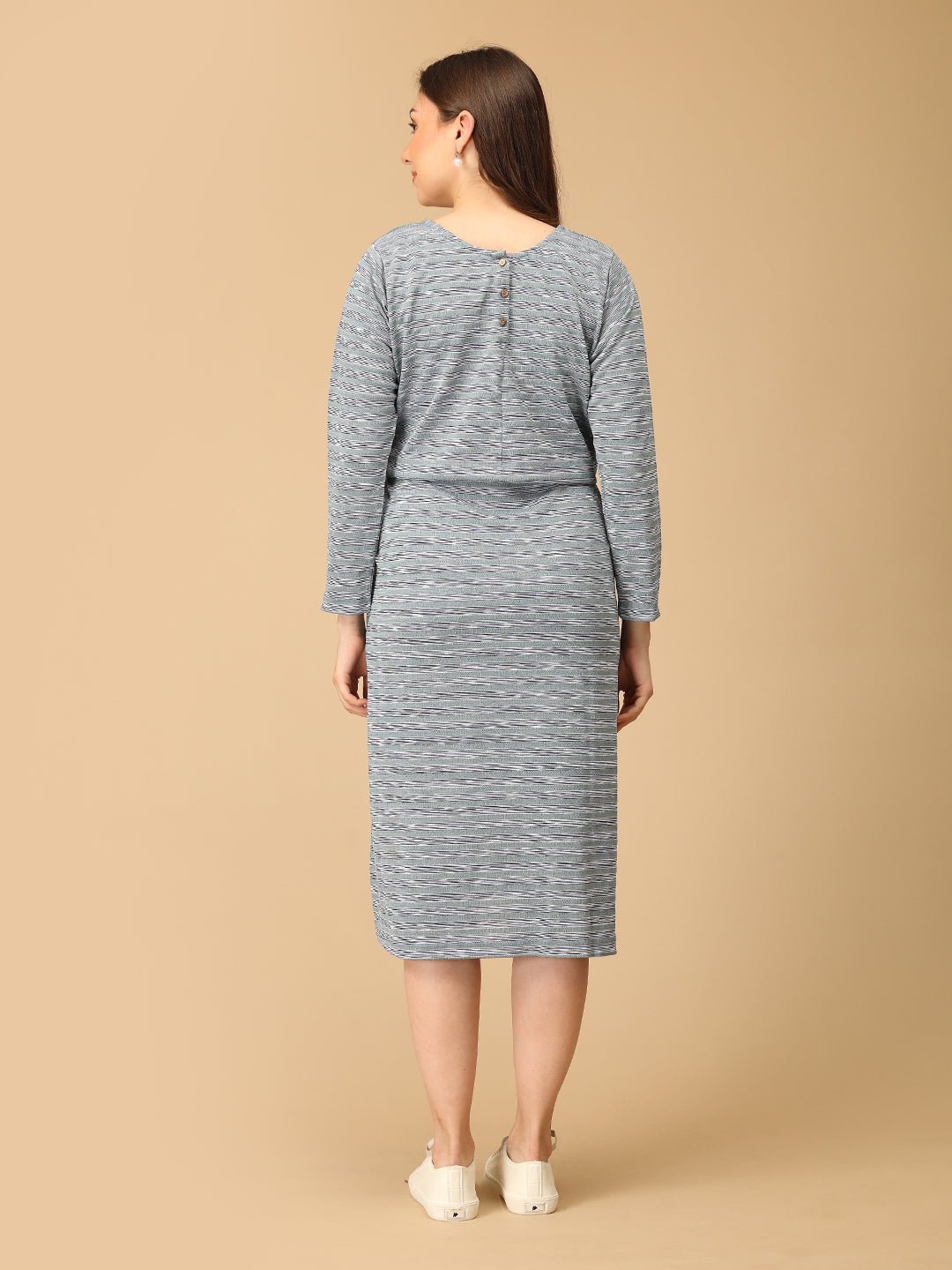 Stylish maternity and nursing dress with shrug, made from soft, breathable fabric. Features a hidden zipper for easy nursing access, sleeveless inner dress, and detachable long-sleeve shrug. Designed for comfort and versatility during and after pregnancy. Includes convenient pockets and offers a flattering fit for everyday wear.