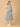 Stylish maternity and nursing dress with shrug, made from soft, breathable fabric. Features a hidden zipper for easy nursing access, sleeveless inner dress, and detachable long-sleeve shrug. Designed for comfort and versatility during and after pregnancy. Includes convenient pockets and offers a flattering fit for everyday wear.