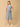 Stylish maternity and nursing dress with shrug, made from soft, breathable fabric. Features a hidden zipper for easy nursing access, sleeveless inner dress, and detachable long-sleeve shrug. Designed for comfort and versatility during and after pregnancy. Includes convenient pockets and offers a flattering fit for everyday wear.