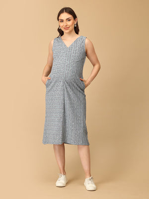 Stylish maternity and nursing dress with shrug, made from soft, breathable fabric. Features a hidden zipper for easy nursing access, sleeveless inner dress, and detachable long-sleeve shrug. Designed for comfort and versatility during and after pregnancy. Includes convenient pockets and offers a flattering fit for everyday wear.