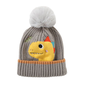Front facing view of the Little Surprise Box Kids Grey coloured  Winter Cap & Neck Muffler Set, with a yellow dinosaur patch. 