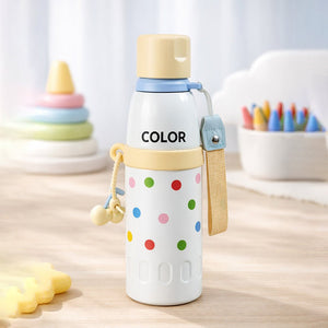 Little Surprise Box Yellow Polka Dots & Stripes Kids Water Bottle (520ml) - Water Bottle - kept on a wooden table