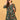 Model in green floral maternity and nursing midi dress styled with beige heels.