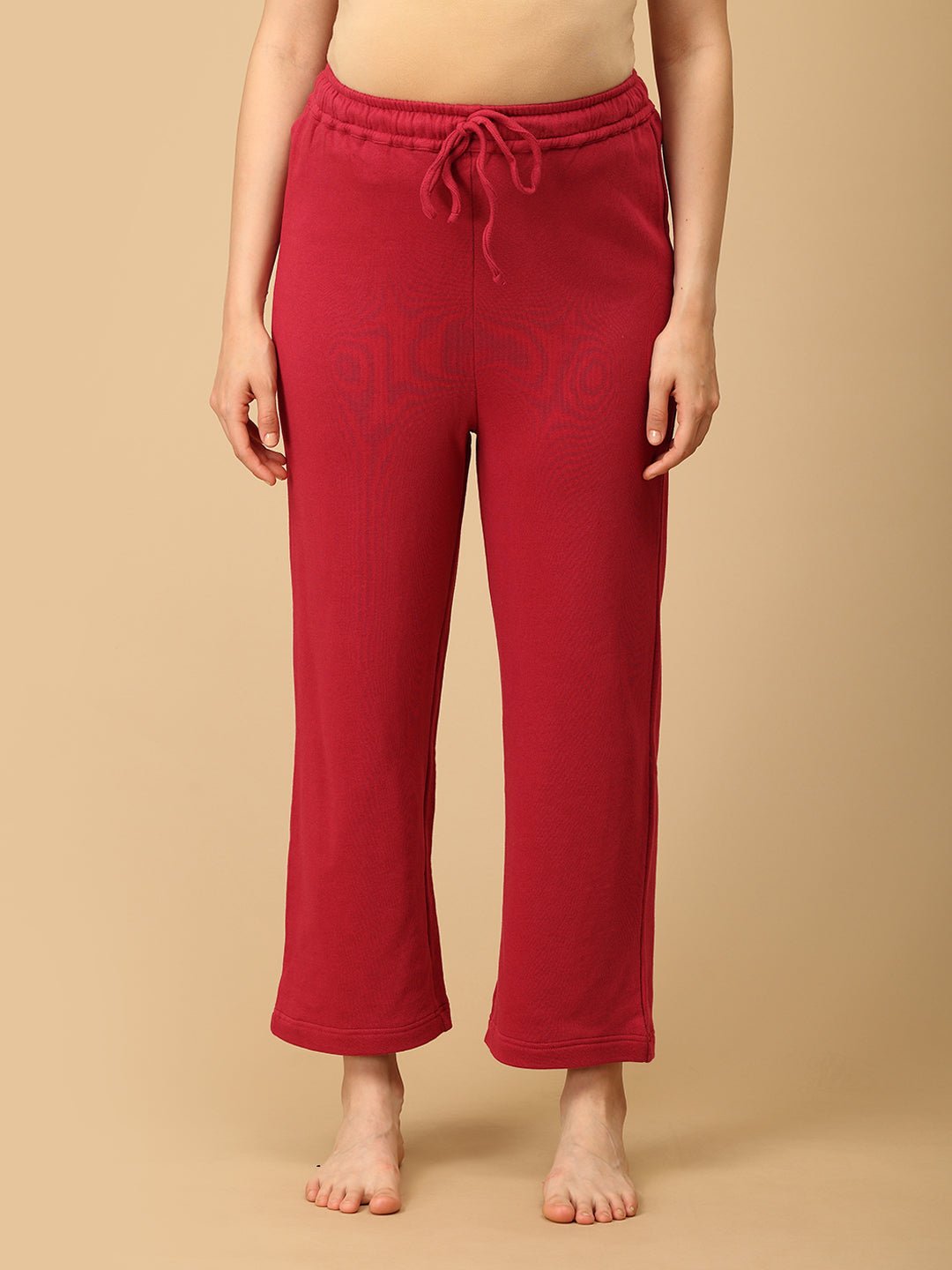 Front view of maternity pajama pants in magenta with adjustable waistband from The Mom Store.