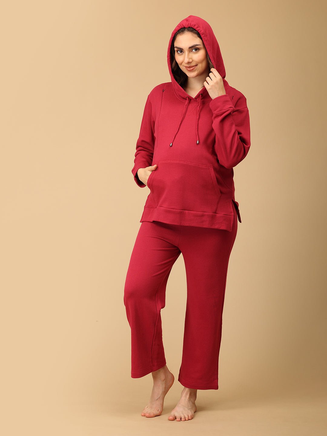 Rear view of The Mom Store maternity pajama pants in magenta, designed for growing belly support.