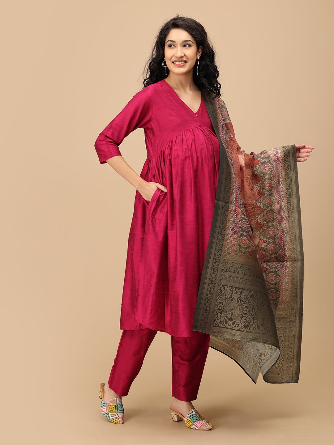 Front angle of The Mom Store magenta silk maternity kurta set styled with rich traditional dupatta.