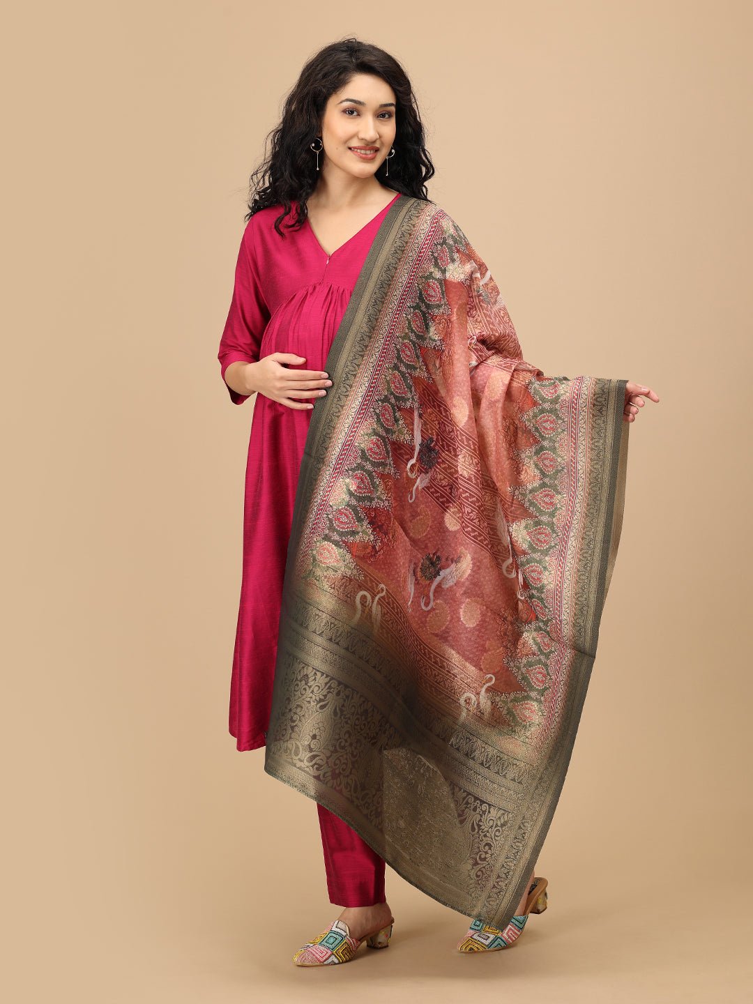 Side pose of The Mom Store magenta maternity and nursing silk kurta set with patterned dupatta.