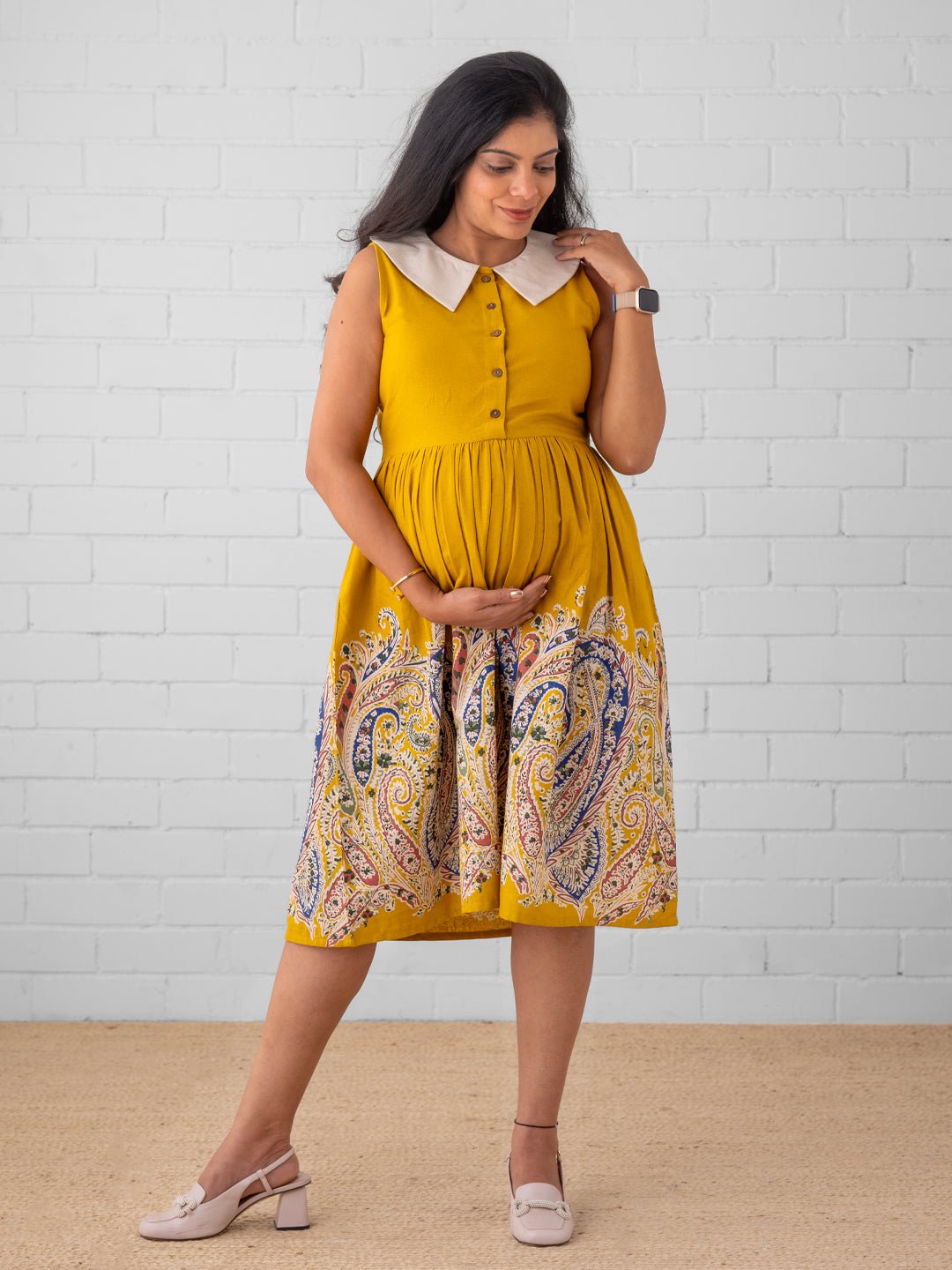 Flowy mustard maternity dress with printed border and white collar – The Mom Store.