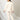 Pregnant model wearing Marshmallow Maternity and Feeding Pajama Loungewear Set from the mom store turned backwards