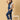 Side pose of pregnant woman in The Mom Store blue Denim Maternity Dungaree with Side Buttons and sunglasses