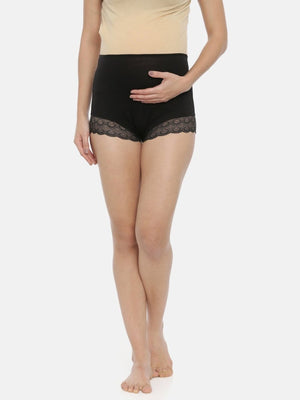 Model wearing black coloured Mama Over Belly Support Panties from the Mom Store