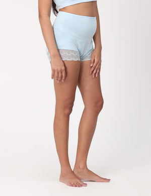 Right side view of Pregnant Model wearing sky blue coloured Mama Over Belly Support Panties from the Mom Store 