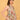 Side angle view of Abstract Flora Maternity and Nursing Dress showing bump-friendly gathered waist and flowy fit.
