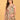 Upper body portrait of model wearing Abstract Flora Maternity and Nursing Dress with sleeveless cut and soft gathers.