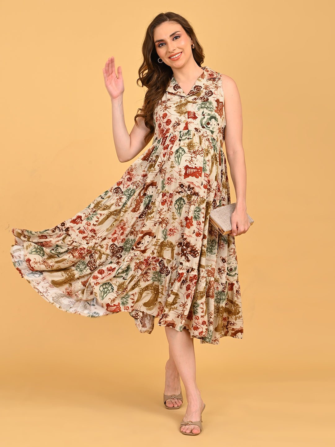 Abstract Flora Maternity and Nursing Dress in flowy tiered silhouette highlighting soft drape and abstract floral pattern.