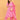 Model styling pink maternity kurta set with dupatta and beige handbag for festive wear.