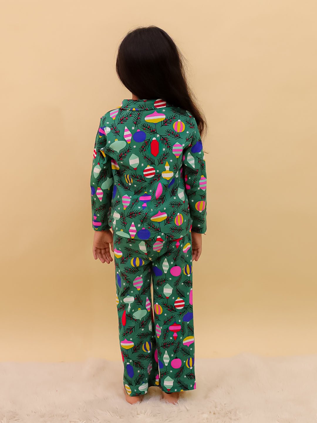 Back view of The Mom Store Merry Snuggle Squad Christmas Pajama Set – soft, safe, and cozy kids nightwear.