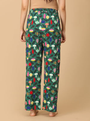 Close up of trousers of Pregnant model wearing Merry Snuggle Squad Maternity Pajama Set from the mom store facing backwards